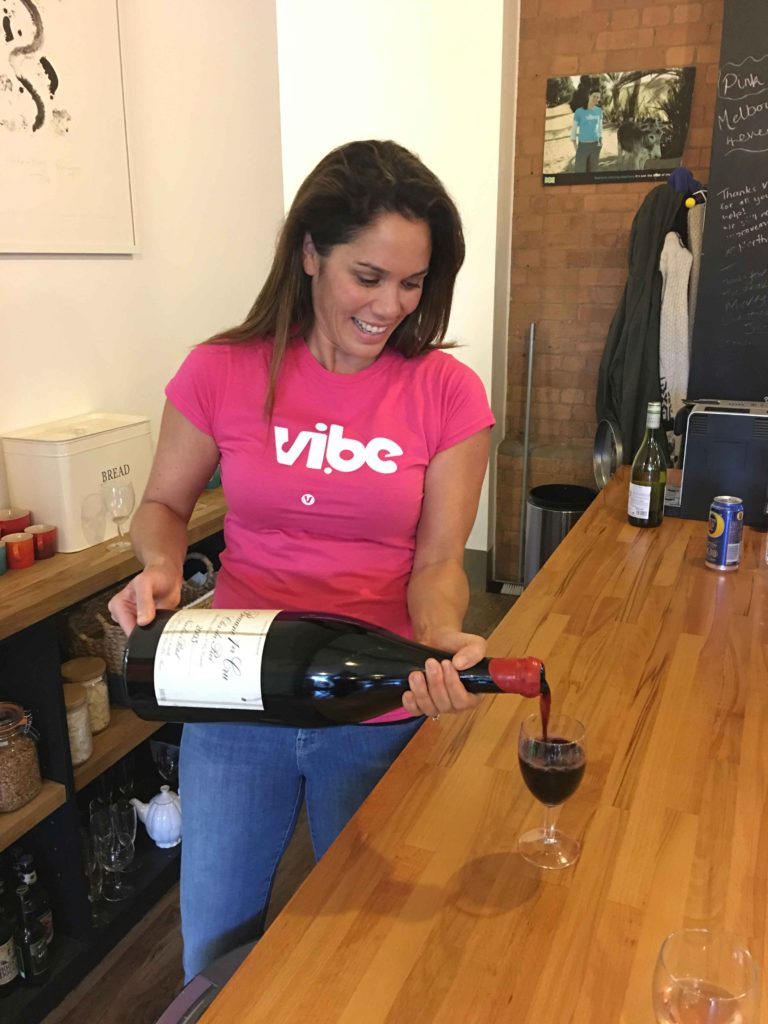Vibe Director with bottle of jeroboam at Vibe HQ London UK