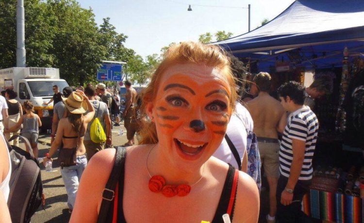Vibe Primary Teacher Caitlin with her face painted in Zurich, Switzerland