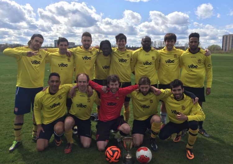 Vibe Teacher Ian with his football team on the pitch in London