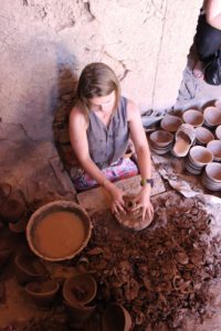 Vibe Teacher Rhiannon making pottery in Morocco