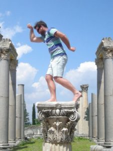 Vibe PE Teacher Ben reenacting a Statue in Greece