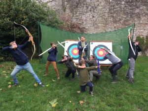 Vibe Teaching Agencies Jack playing a game of archery with the family in London UK