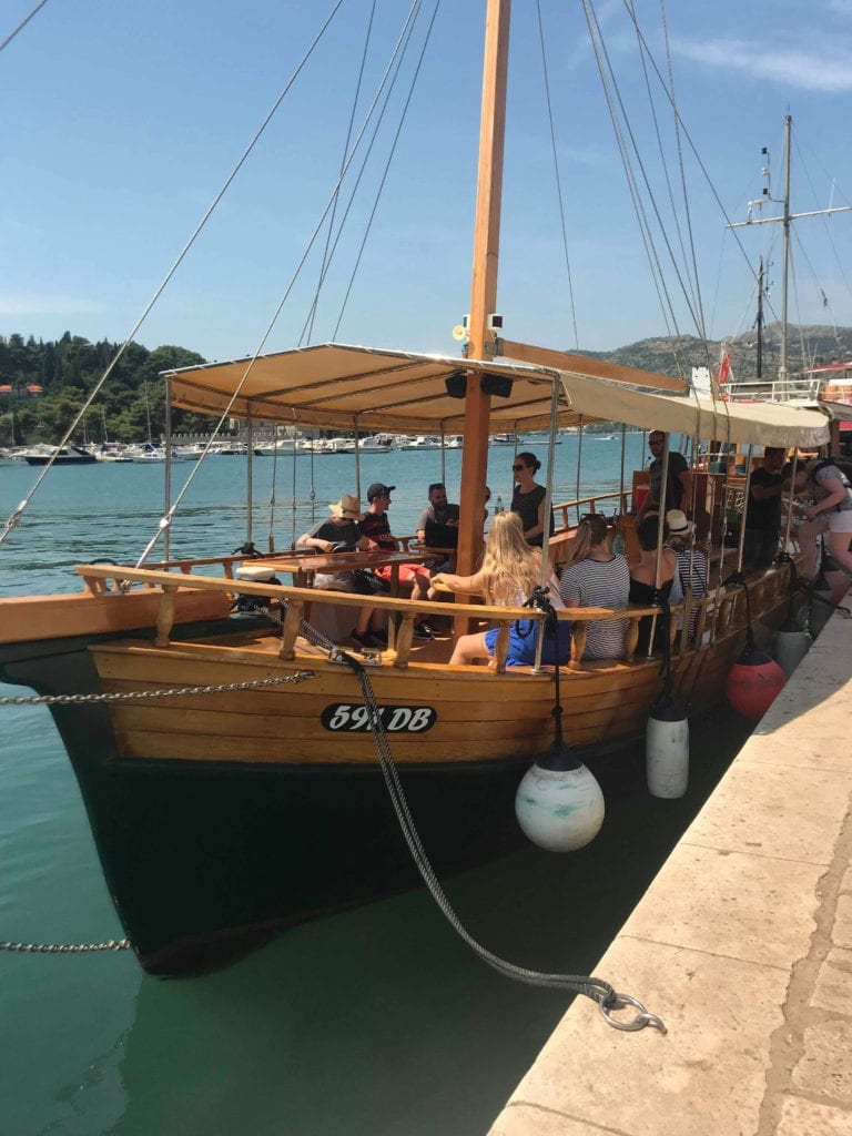 Getting onboard a boat in Dubrovnik having a break from teaching in London